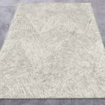 Handmade Off White Tufted Wool Area Rug