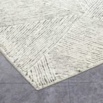 Handmade Off White Tufted Wool Area Rug