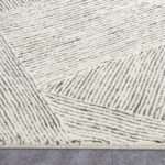 Handmade Off White Tufted Wool Area Rug